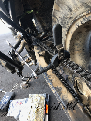 Breaking the old chain with a 14mm wrench