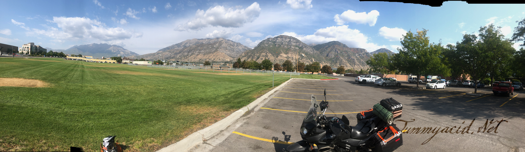 The old high school behind those trees and the mountains above